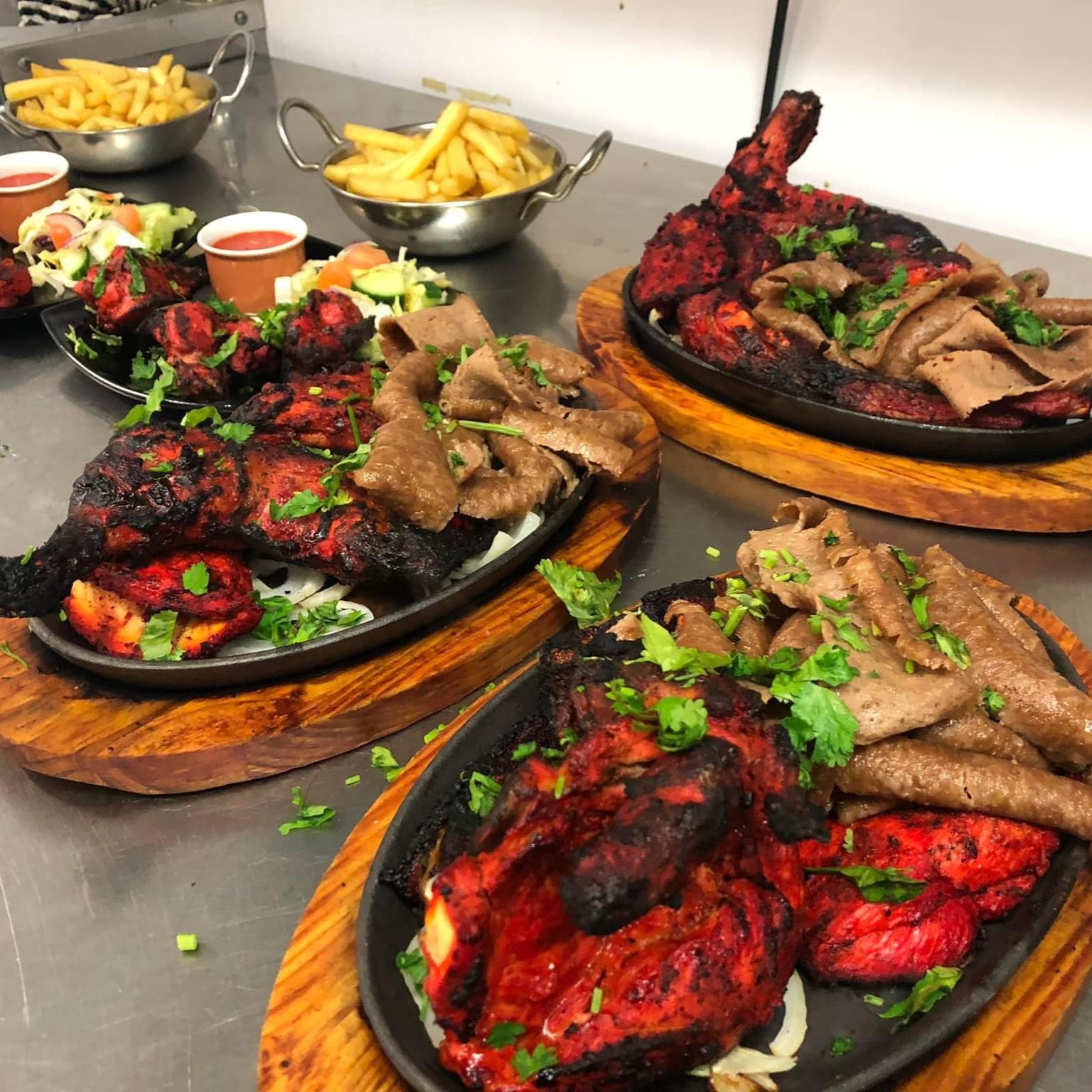 Chicken tikka masala with sides Served at Wee Sunny’s in Dundee